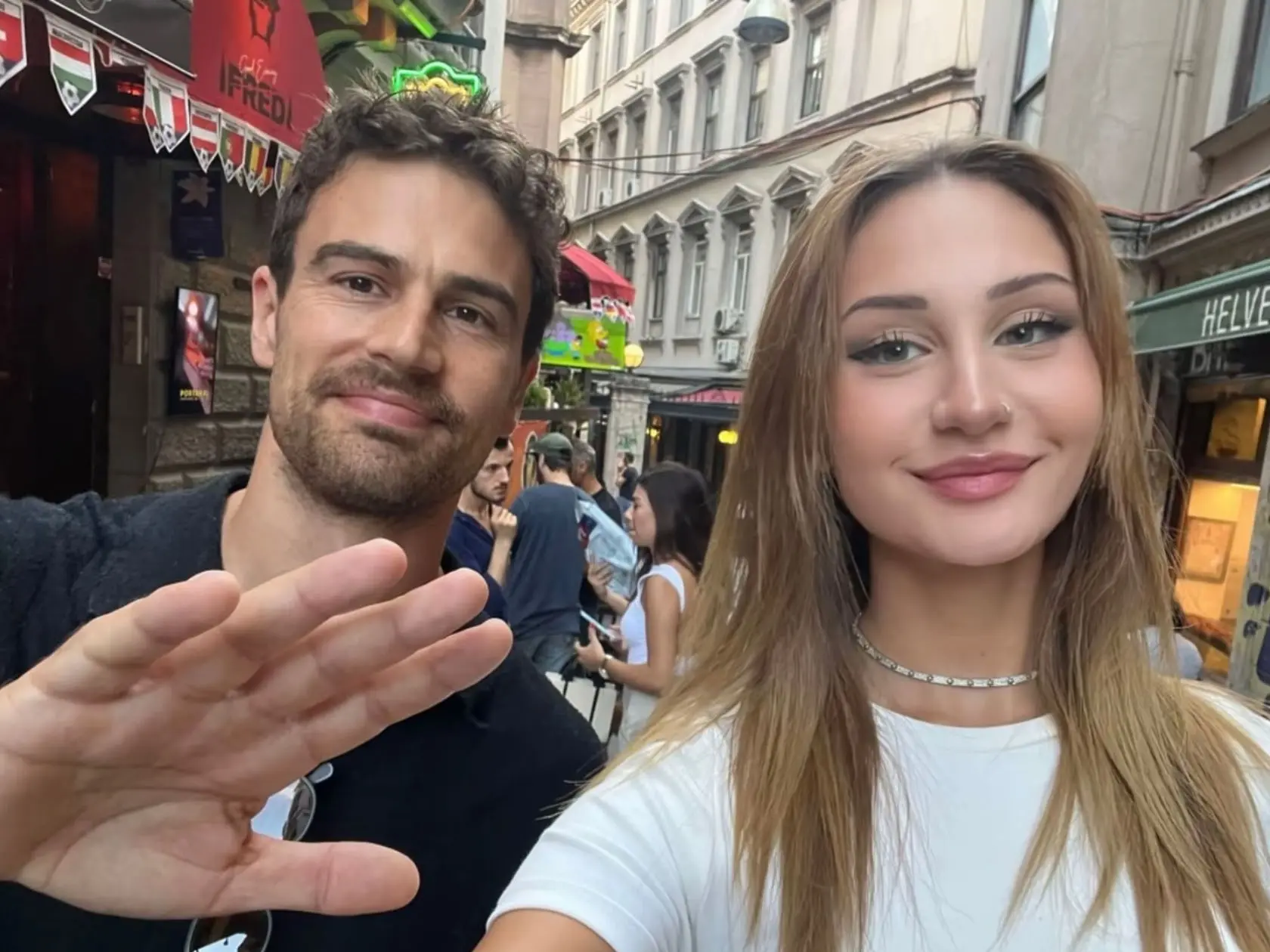 Theo James taking a selfie with a fan in Istanbul during his visit.